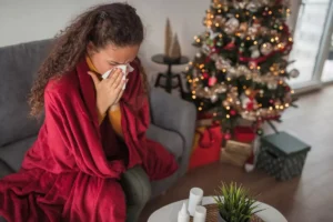 1_Girl-sitting-at-home-during-winter-holidays-with-a-flu-virus