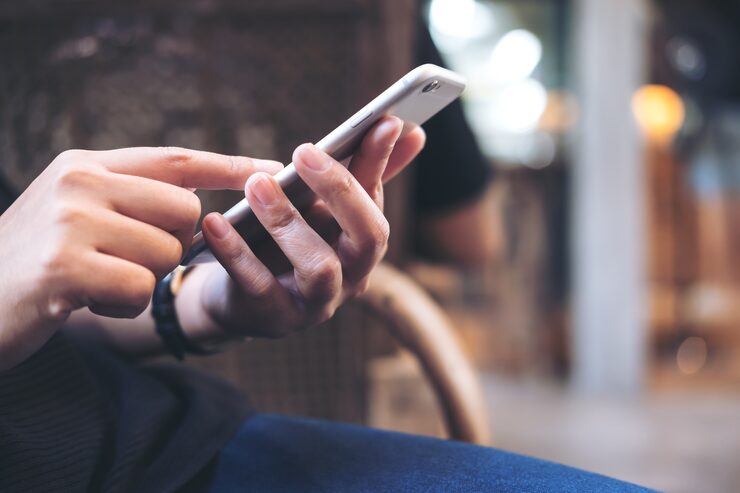 hands-using-smart-phone_9563-2791