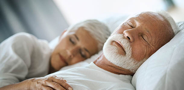 mature_couple_sleeping_soundly